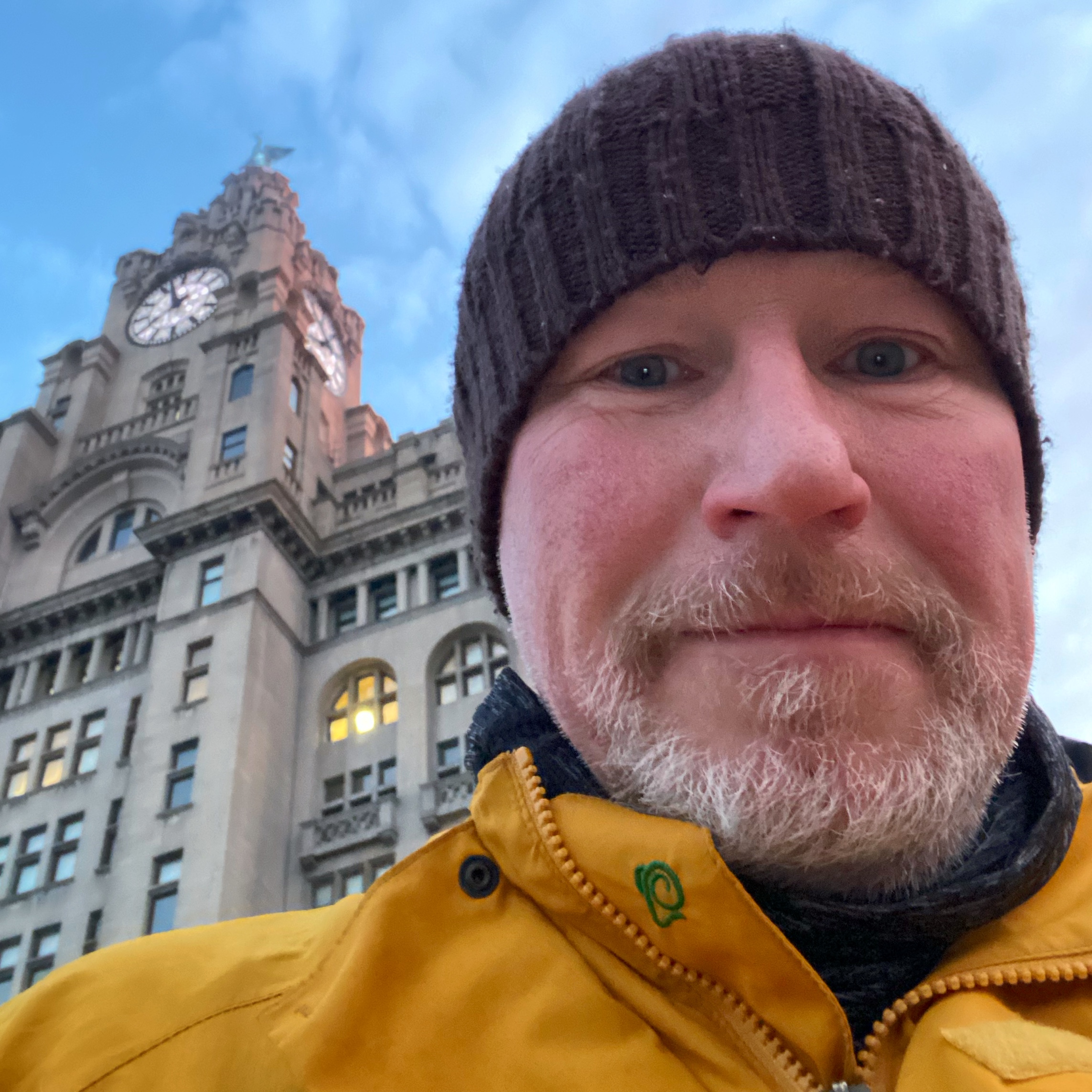 tutor mark wood outside liver buildings liverpool